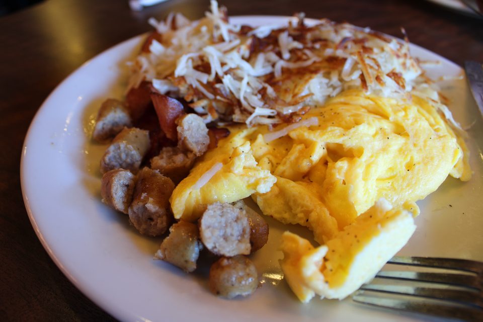 An American Slam: eggs, bacon, sausage, hash browns, toast