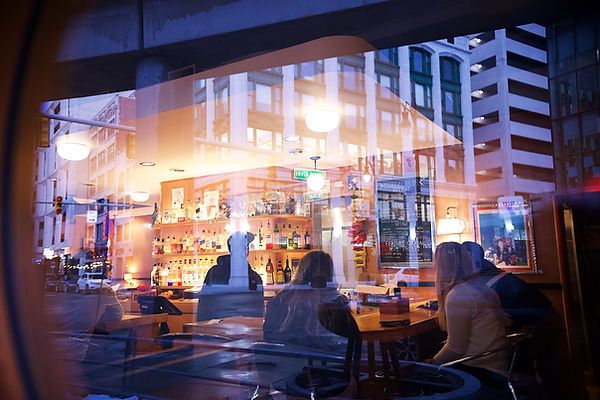 Queens Bar exterior at night