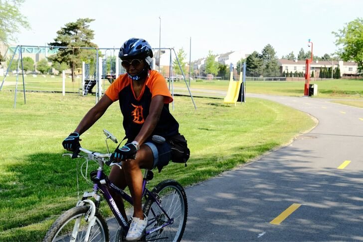 Mayor Dennis W. Archer Greenway: Cyclist on the greenway