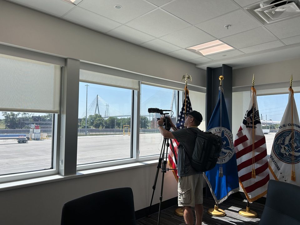 A briefing at the U.S. port of entry, the tower in the window, 2026