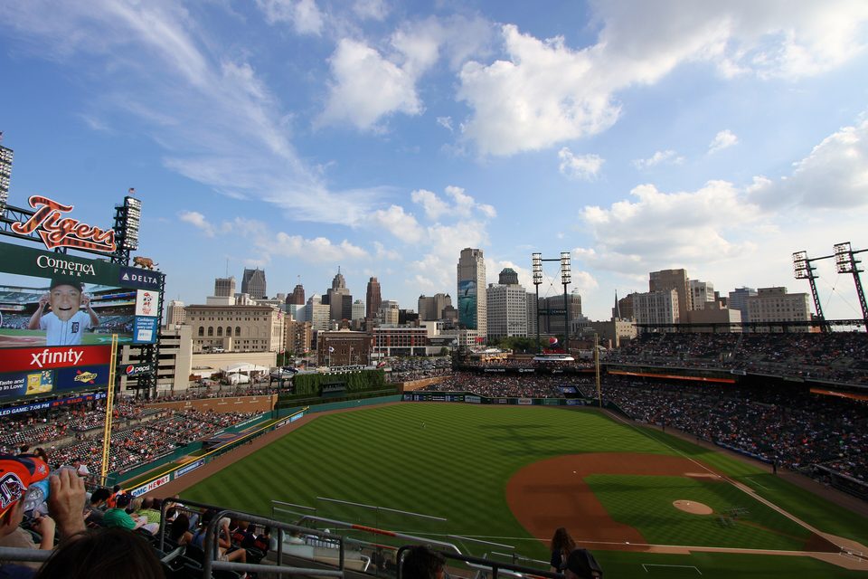 A packed Comerica Park with the downtown skyline beyond
