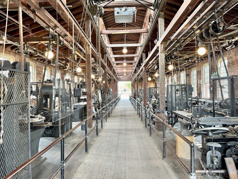 The Armington & Sims machine shop, its machines driven by belts from the overhead line shafts (photo: 2024)
