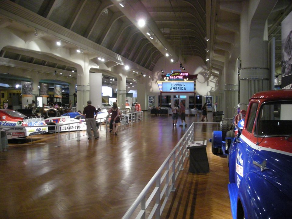 The long hall of the Driving America exhibit, lined with cars on both sides (2012)