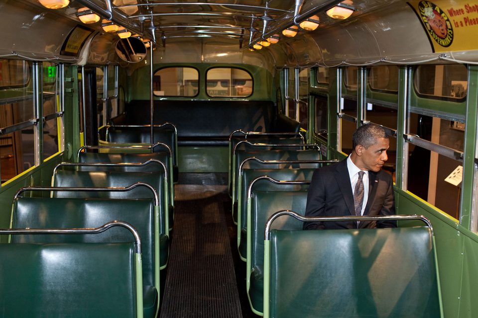 President Barack Obama sits on the Rosa Parks bus at the museum, April 18, 2012