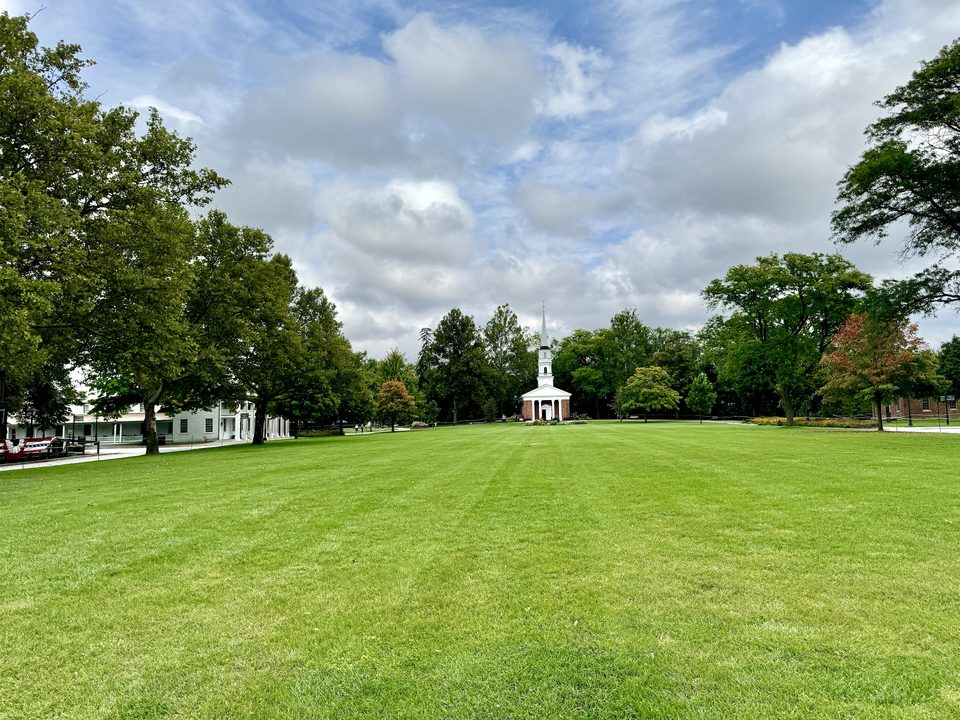 The Village Green, the heart of the village, with Martha-Mary Chapel at the far end (2024)