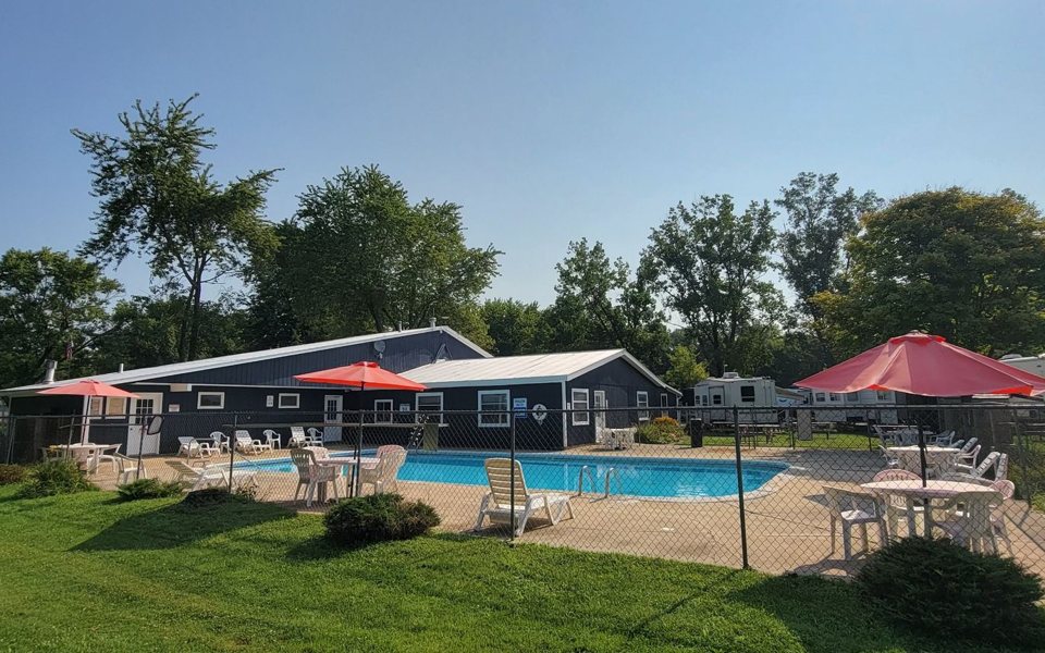 The campground pool with a shade canopy