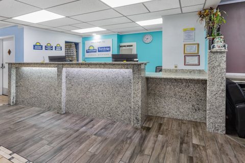The front desk with a granite counter