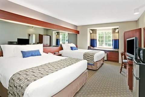 A guest room with two beds