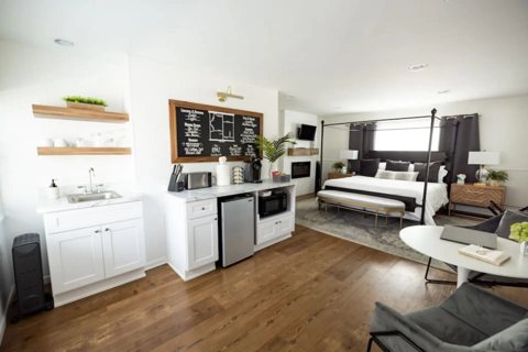 A room with a small kitchenette