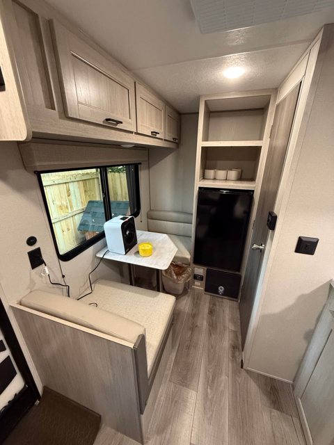The trailer interior with a dining nook
