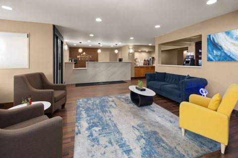 Lobby seating area with a blue sofa