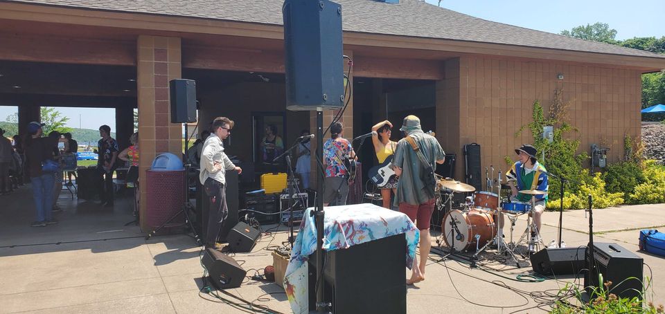 Band playing by the park pavilion at Keweenaw Pridefest