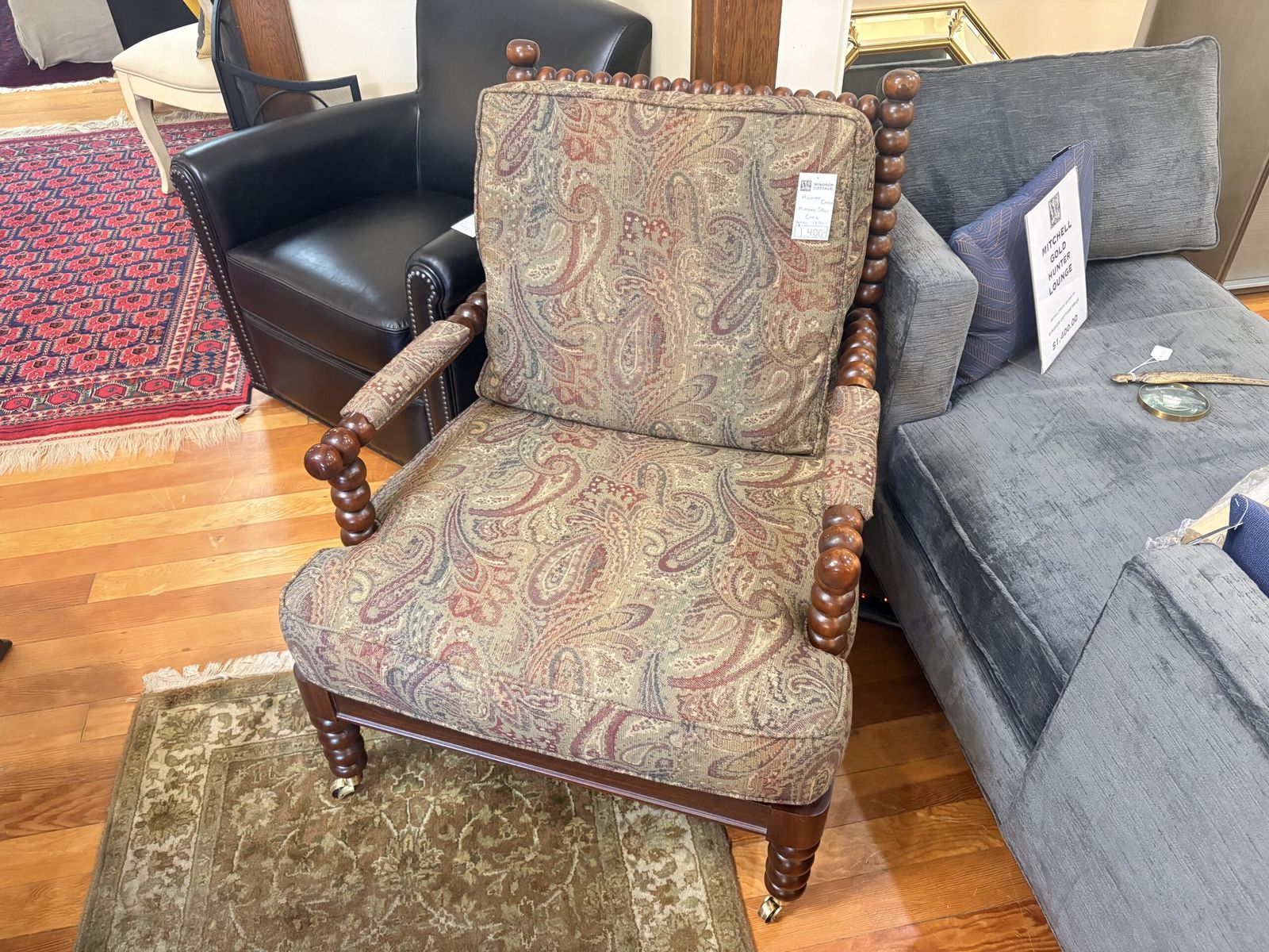 Paisley upholstered armchair in the Windsor Cottage showroom