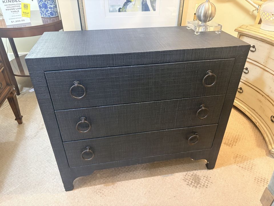 Dark three-drawer chest with ring pulls
