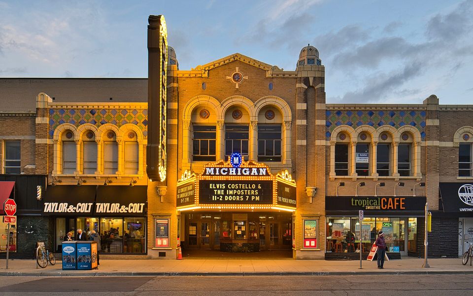 The Michigan Theater's glowing marquee on Liberty Street