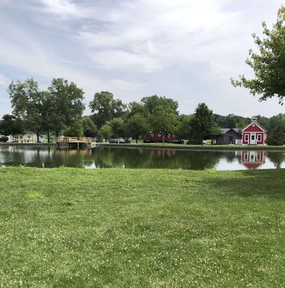 Coan Lake and the red schoolhouse in Heritage Park