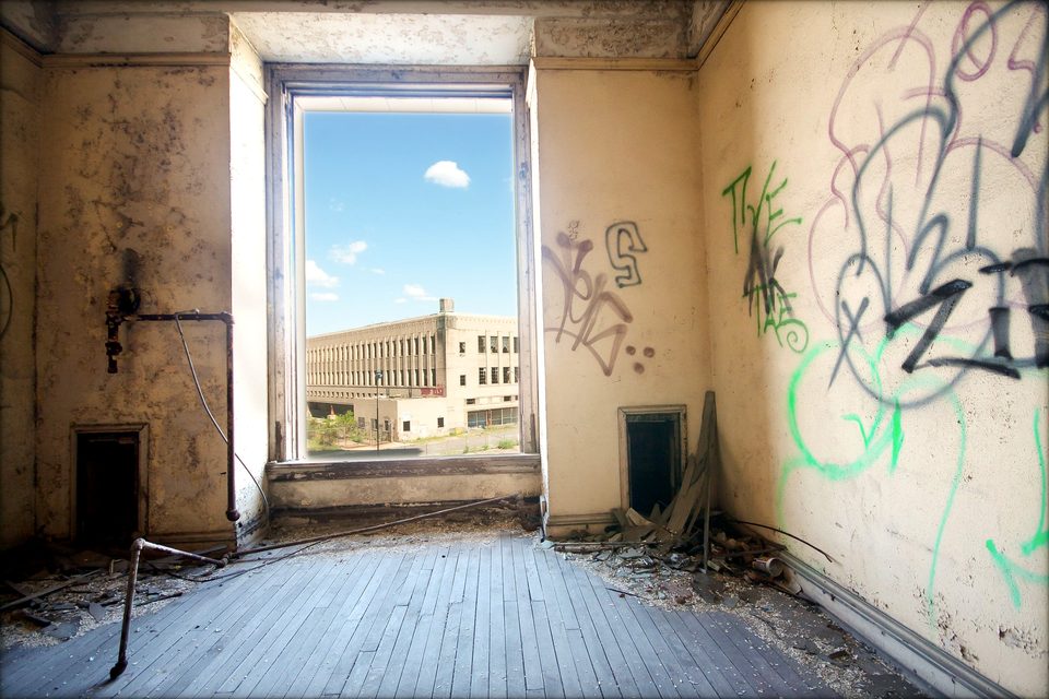 A graffiti-covered room framing today’s Newlab building, 2009