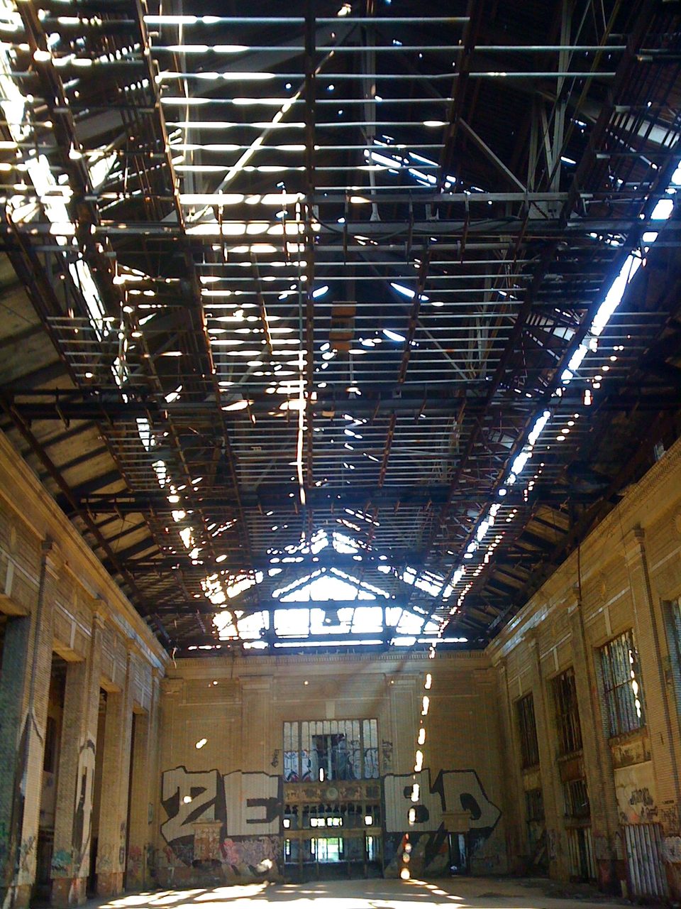 The concourse’s steel roof frame and graffiti end wall, 2010