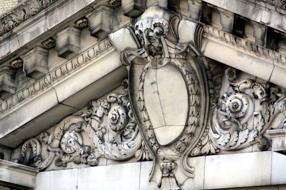 Weathered carved ornament on the facade, 2010