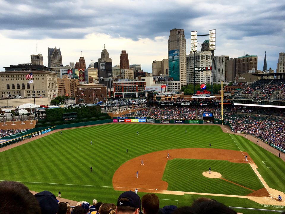 A game at Comerica Park seen from the upper deck, with the downtown Detroit skyline beyond